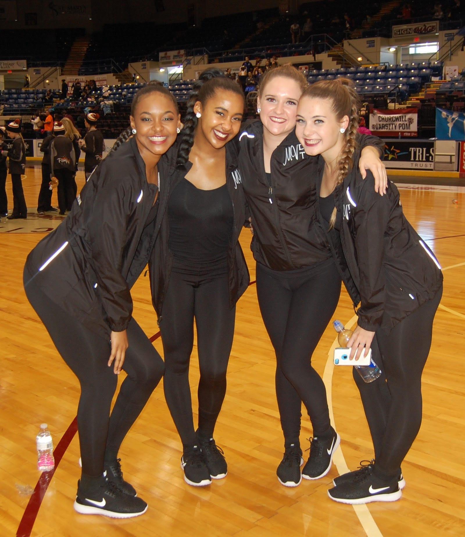 Seniors Danielle McDonald, Sydney Hughes, Kate O'Sullivan, and Caitlyn Ryan serve as leaders for their fellow Mercy Varsity Dance teammates. (Photo Credit: Jasmine Williams)