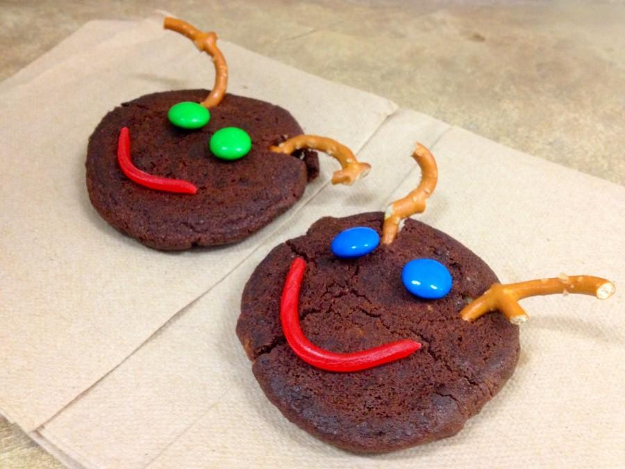 Composed of simply a chocolate cookie, pretzels for the antlers, M&Ms for the eyes, and a Twizler Pull N Peel strip, you can create cute and tasty reindeer cookies that are festive for the holiday season.