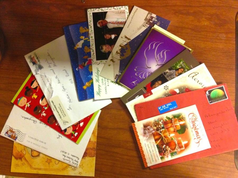 As+the+piles+of+Christmas+cards+begin+to+pour+in%2C+some+question+whether+the+Christmas+card+is+still+relevant+today.