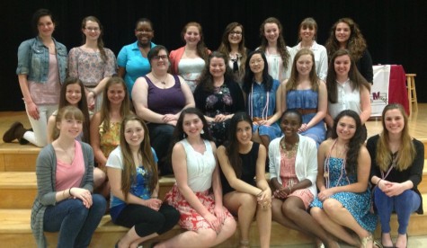 Mrs. Malaney, center, poses with the members of the Tri-M Music Honor Society, of which she is the moderator.  Photo reprinted with permission from Amy Malaney.