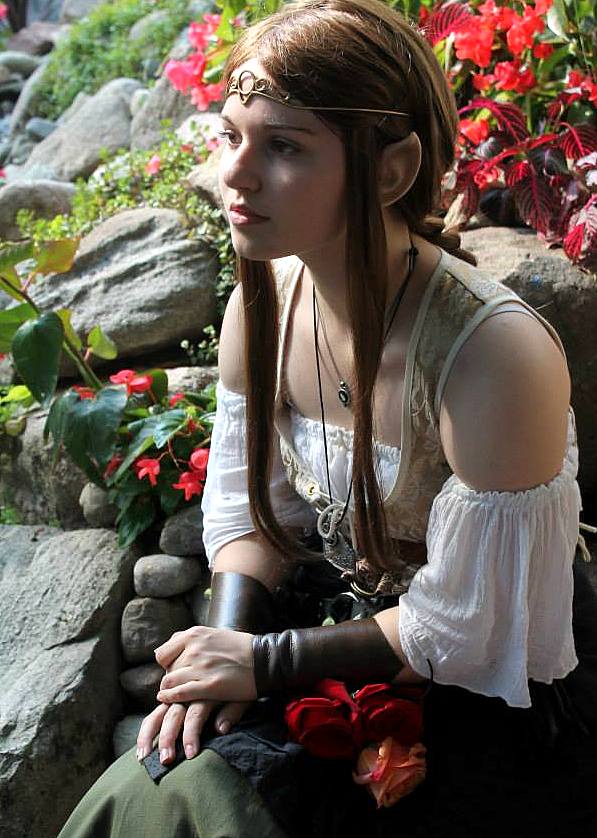 Her+costume+complete+with+elf+ears%2C+Emily+Poppenger+14+watches+passersby+at+Michigans+Renaissance+Festival.++Photo+Credit%3A+Sergio+Mazzotta