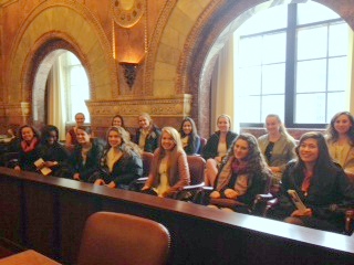 The AP Government Class sits inside of the famous million dollar courtroom adorned with various types of marble and mahogany. 
Photo used with permission by Cindy Richter 