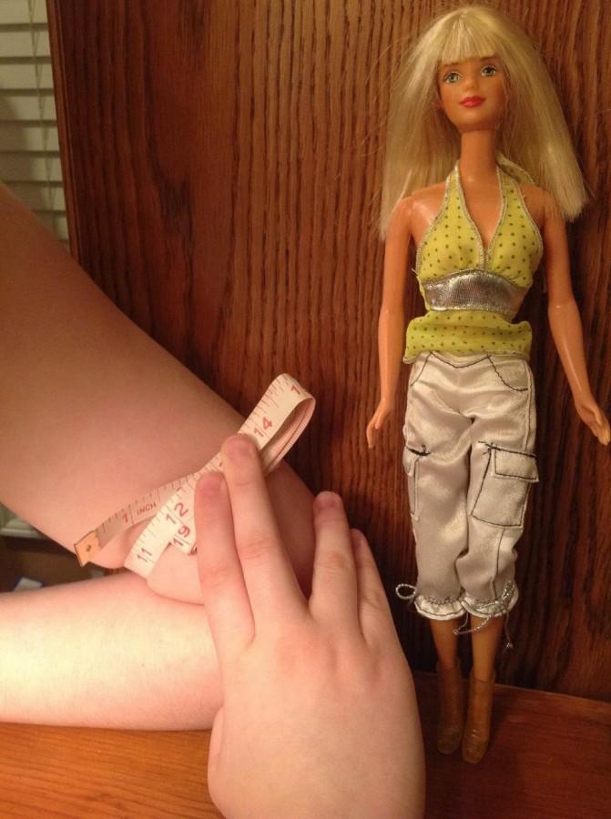 The+Barbie+doll%2C+with+its+unrealistic+proportions%2C+has+been+accused+of+promoting+harmful+body-image+stereotypes+among+girls.+