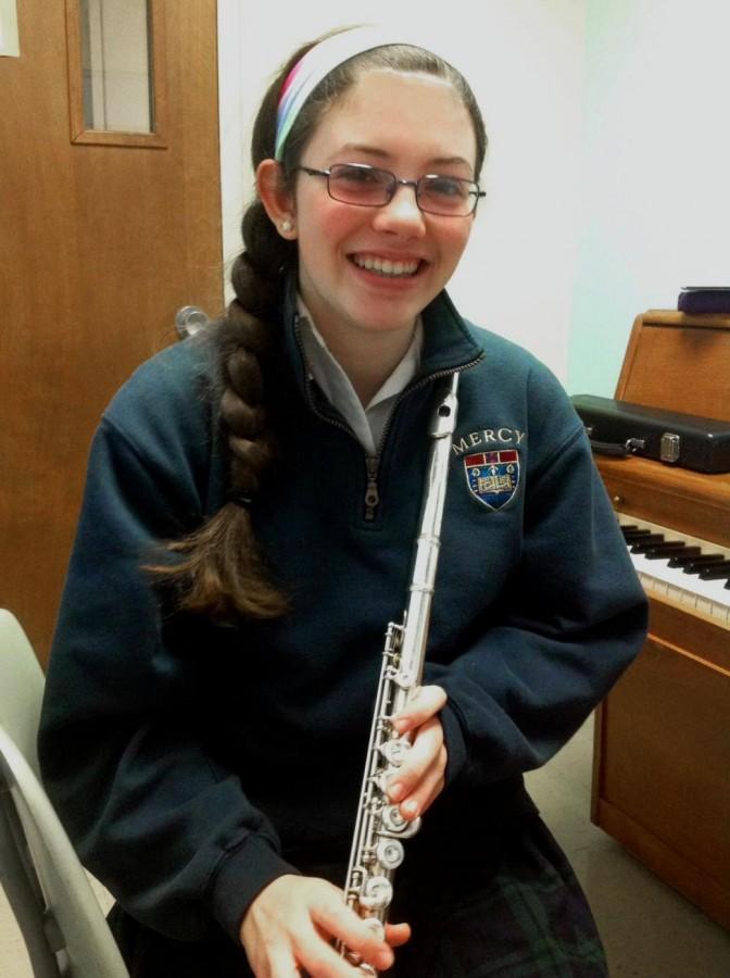 Elise Scarchilli is immersed in music; she plays flute in Mercys orchestra and in the Royal Oak High School marching band, competes in music festivals, and is an avid pianist.