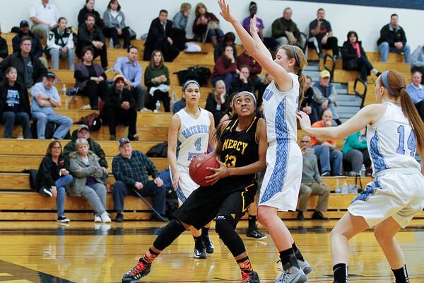 Senior co-captain Taylor Jones looks to score Tuesday night against the Corsairs of Waterford Mott. 
Photo Credit: Timothy Arric (MI Prep Zone). 