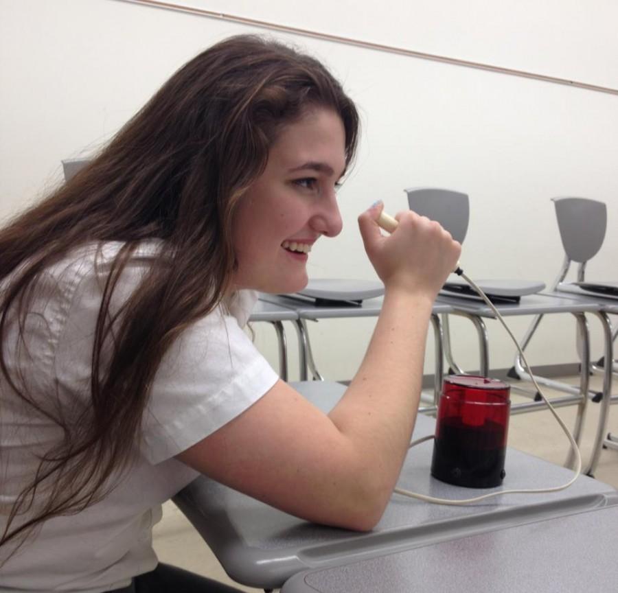 Junior Carmela Sleva, captain of Mercys JV quizbowl team, enjoys the challenge and excitement of quizbowl, whether her team wins or loses (Photo Credit: Alana Sullivan). 
