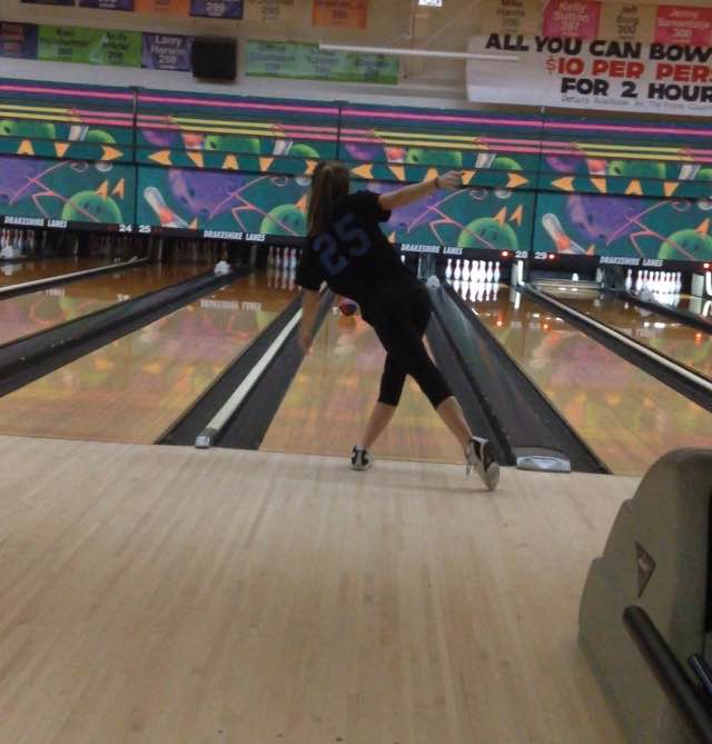 Junior Heather Lillystone perfects her form during bowling practices at Drakeshire Lanes, two to three times a week (Photo Credit: Lilly Blake). 