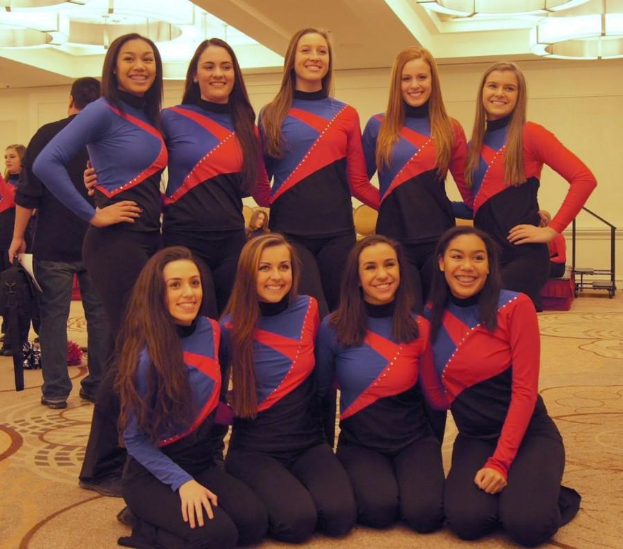The Mid American Pompon All Stars from Mercy High School pose at a dress rehearsal the night before Americas Thanksgiving Parade in Detroit (Public Domain: Facebook). 