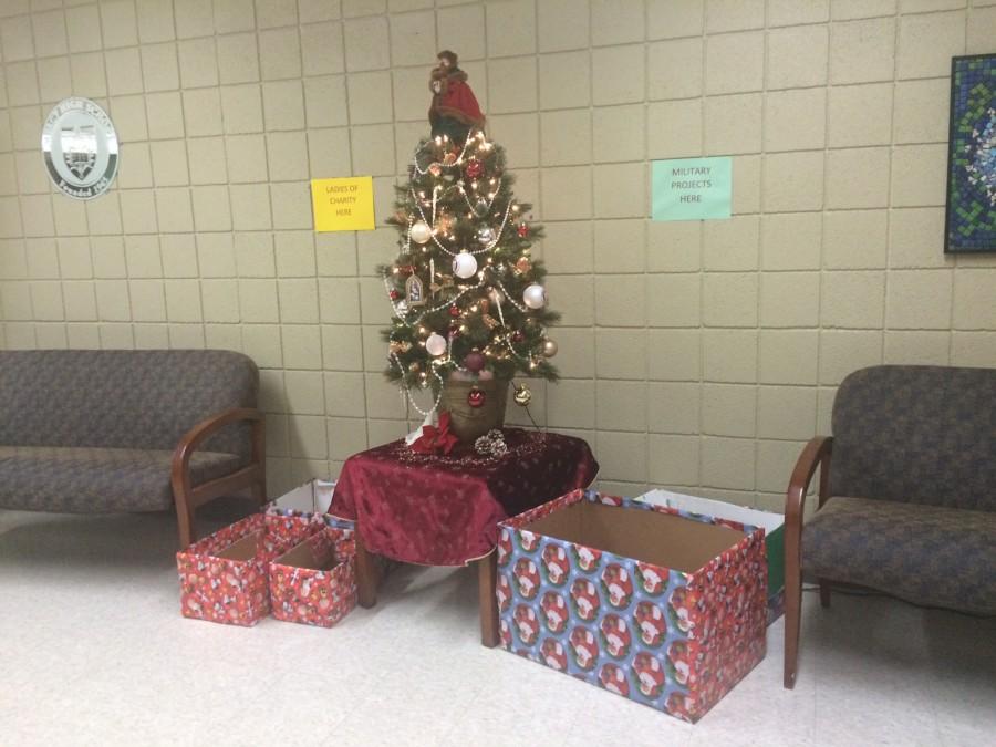 Donations for soldiers are being collected under the Christmas tree until Dec. 8. (Photo credit: Chanel Taylor)