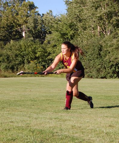  Zabrina LeVasseur warms up before an away game against Marian, in which she was a starting forward. (Photo Credit: Ana Warner)