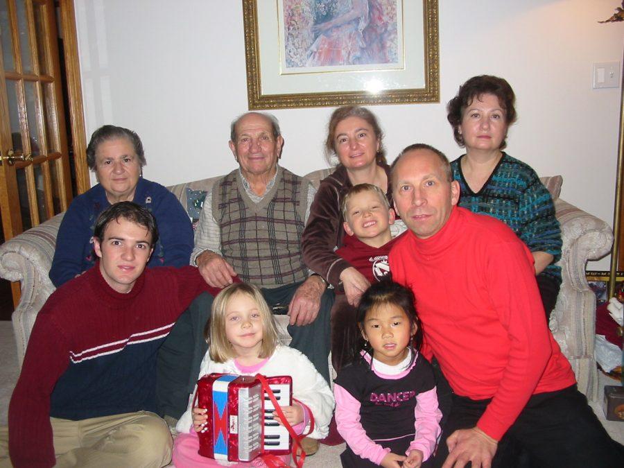 (Top row, left to right) Giuseppina Soave (Nonna),Enrico Soave (Nonno), Rosa Russenberger (Mom), Antonia Soave (Aunt),(Bottom row, left to right) Nicholas Williams (Brother), Clarisa Russenberger, and Jolene Soave (Cousin) relax after eating Christmas Eve dinner. (Photo Credit: Armin Russenberger)