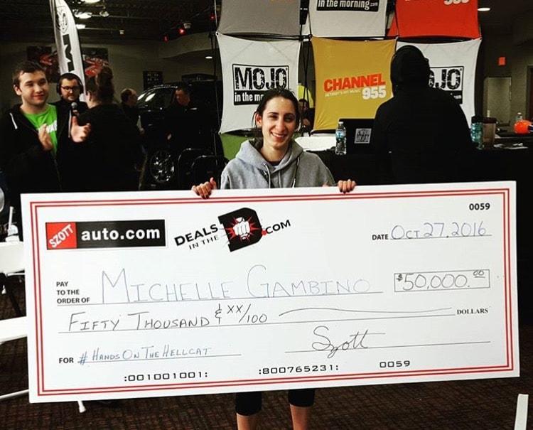  Michelle Gambino stood for over 70 hours in the Hands on the Hellcat competition to win $50,000. (Photo Credit: Michelle Gambino)