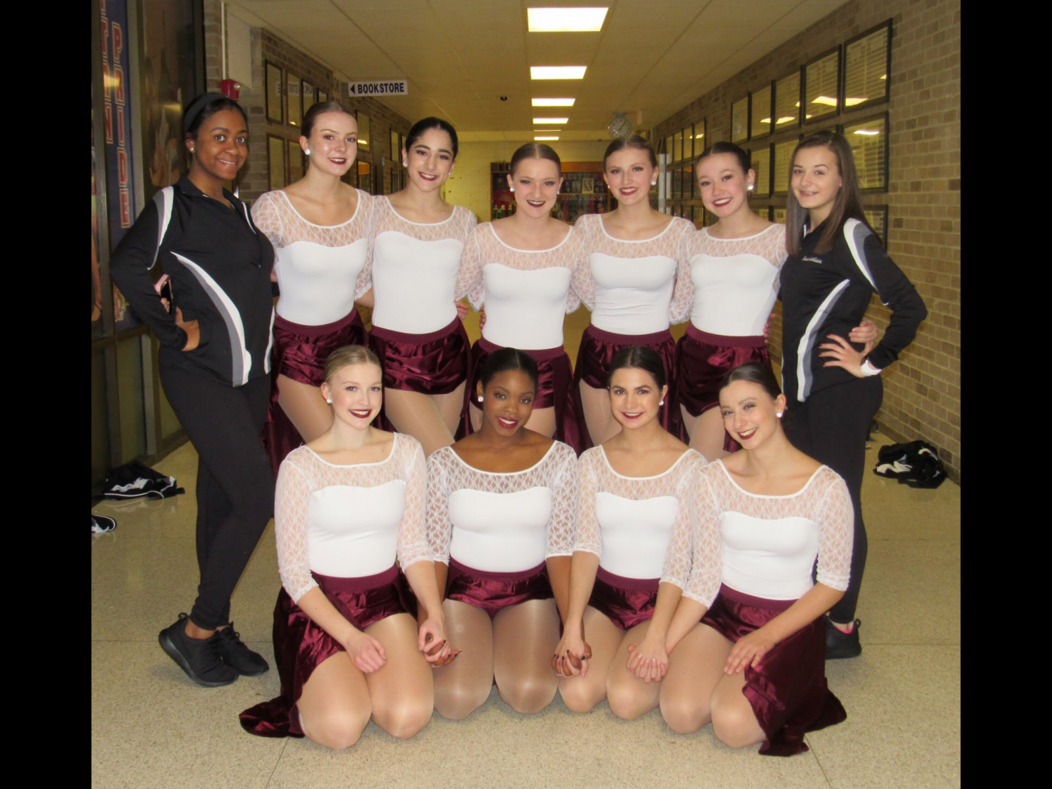 The Mercy Varsity Dance team prepares to perform the routine they worked to perfect over the span of 4 weeks. (Photo used with permission from: Davia Smith)