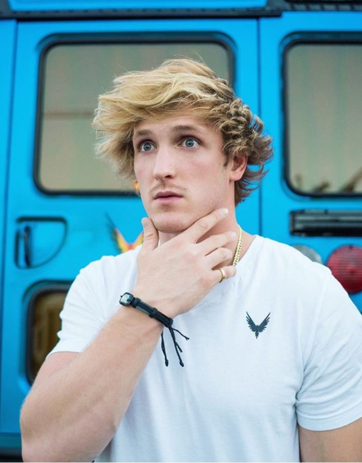 Logan Paul poses on his public Instagram account for his 16.2 million followers. 