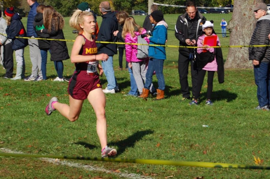 Junior Mackenzie Foy barrels toward the finish line, placing All-League for the CHSL Championships. Mercy placed sixth out of seven teams. 
Photo by Mary McGreevy