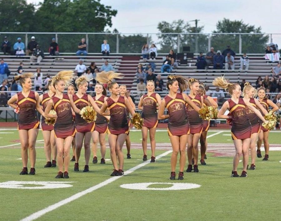 The Mercy Varsity Pom team performing at a football game. Because Mercy is an all girls school and has no football team, the girls take advantage of every opportunity they get to show school spirit. 
Fair Use: Instagram 