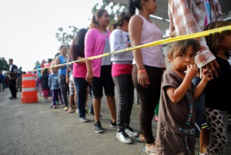 Tensions increase as migrants gather in Tijuana