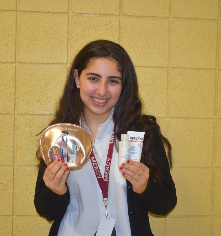 Senior Nicole Hesano carries a emergency kit in her backpack with products to help her skin cope with the cold weather.
Photo by: Sabrina Yono