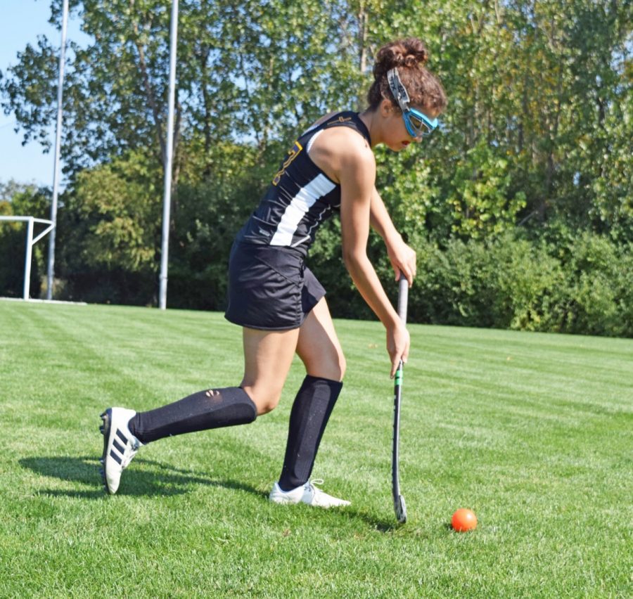 Sophomore Julia Rea shoots the ball for a goal mid-practice. Photo by Rachael Salah