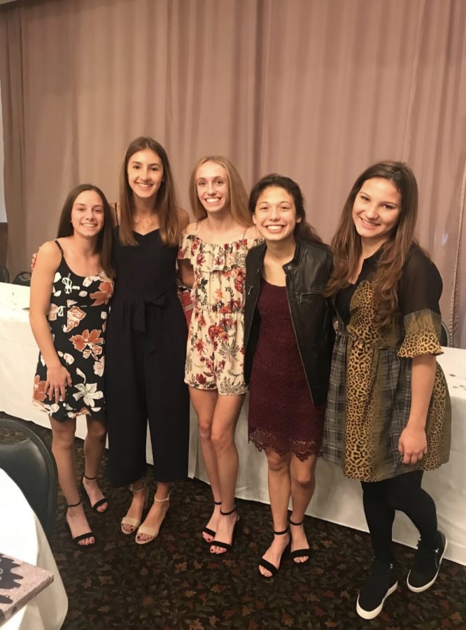 The+cross+country+team+at+their+banquet%2C+which+marks+the+end+of+the+season.+Left+to+right%3A+freshman+Reagan+Sullivan%2C+junior+Megan+Mallie%2C+junior+Mackenzie+Sullivan%2C+junior+Katie+Kim%2C+and+senior+Gabby+Pluszczynski.+Photo+used+with+permission+from+Katie+Kim