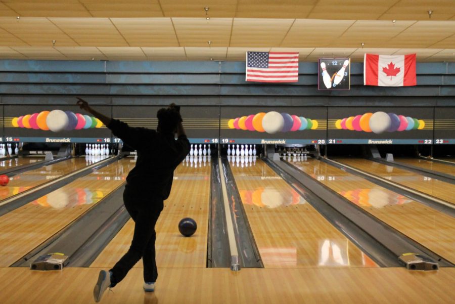 Junior LaNiya Brantley bowls at the Bowling One Lanes for the team’s sixth meet. Photo by Emily Walugembe