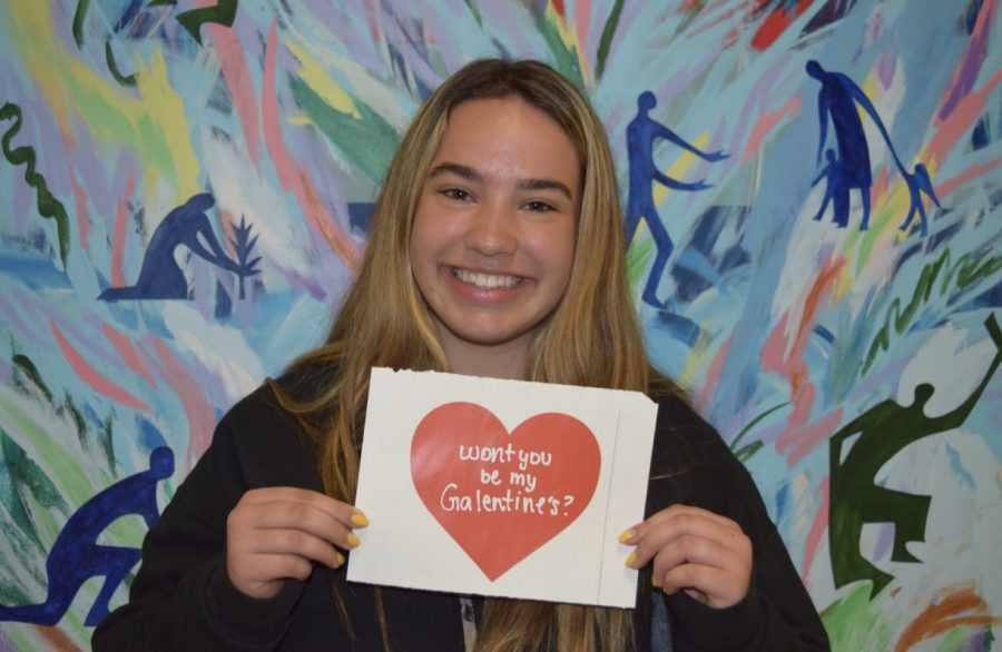Junior Gabi Michallef poses with a candy gram she made to give away to a friend on Galentine’s Day. Photo by Clare Jones