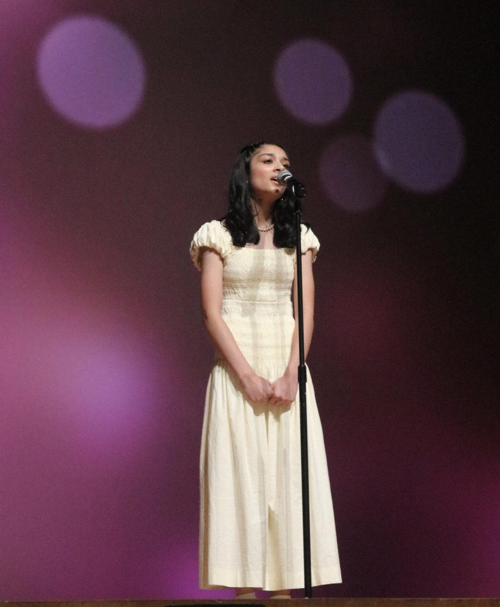 Freshman Eshaal Memon sings beautifully during the talent show.